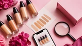 Base de maquiagem com celular e conferência de produto original